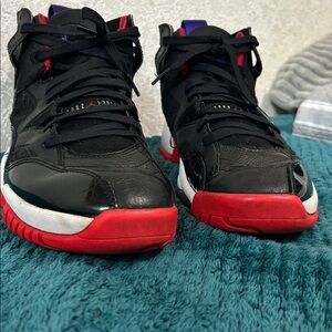 Black and Red Jordan’s jump man two Trey
